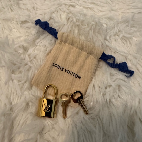 Louis Vuitton Gold and Silver Lock Set